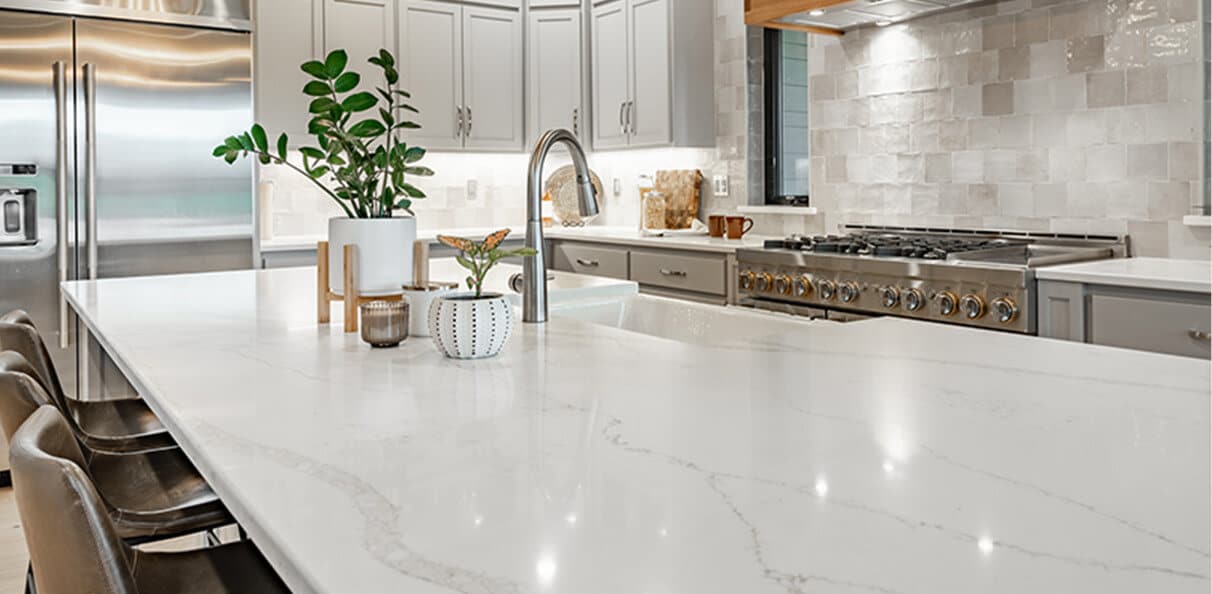 A stylish kitchen with a luxurious marble countertop.